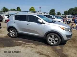 2013 Kia Sportage LX with VIN KNDPBCA24D7521374, listed as a Copart auction lot 61654725 with 146,378 mi miles and Salvage title. Bid and sale history available at DreamBid. Image 4.