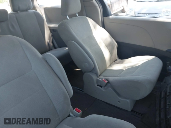 2015 Toyota Sienna L with VIN 5TDZK3DCXFS640245, listed as a IAAI auction lot 42310815 with 76,260 mi miles and . Bid and sale history available at DreamBid. Image 8.
