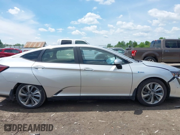 2018 Honda Clarity z VIN JHMZC5F14JC007026, wystawiony jako IAAI lot #42361556 z przebiegiem 74 132 mil mil oraz . Historia ofert i sprzedaży dostępna na DreamBid. Obrazek 13.