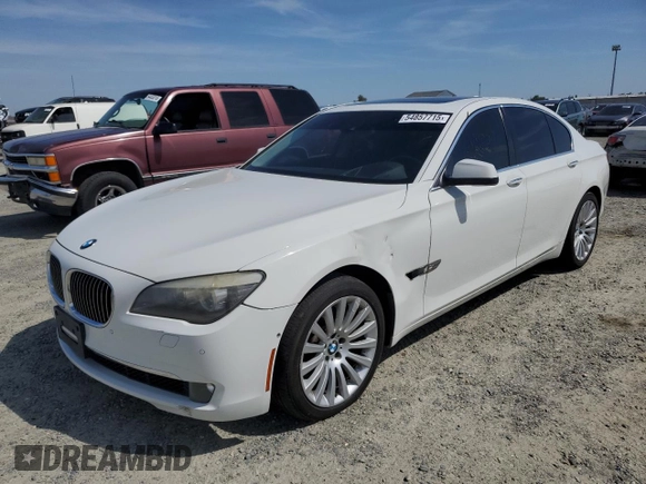 2012 BMW 7 Series 750i xDrive with VIN WBAKC6C56CDX99416, listed as a Copart auction lot 54857715 with 114,198 mi miles and Salvage Title. Bid and sale history available at DreamBid. Image 1.