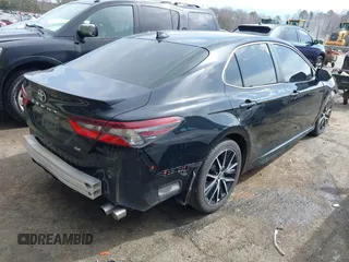 2022 Toyota Camry SE with VIN 4T1G11AK6NU660671, listed as a IAAI auction lot 41768738 with 74,867 mi miles. Bid and sale history available at carsss.com. Image 4.