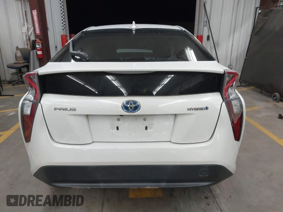 2016 Toyota Prius Two with VIN JTDKBRFU3G3513060, listed as a IAAI auction lot 41789034 with 153,391 mi miles and . Bid and sale history available at DreamBid. Image 16.