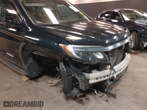 2016 Honda Pilot Touring with VIN 5FNYF6H98GB035226, listed as a IAAI auction lot 42022957 with 103,842 mi miles and . Bid and sale history available at DreamBid. Image 6.