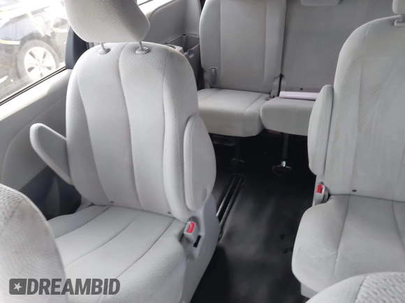 2013 Toyota Sienna L with VIN 5TDZK3DC9DS357722, listed as a IAAI auction lot 42369515 with 190,548 mi miles and . Bid and sale history available at DreamBid. Image 8.