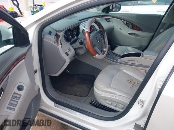 2012 Buick LaCrosse Premium 1 z VIN 1G4GD5E30CF116878, wystawiony jako IAAI lot #42209045 z przebiegiem 129 074 mil mil oraz . Historia ofert i sprzedaży dostępna na DreamBid. Obrazek 12.
