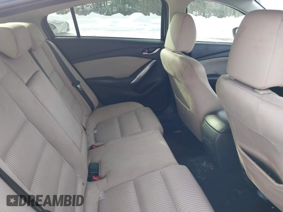 2016 Mazda 6 i Sport with VIN JM1GJ1U53G1407290, listed as a IAAI auction lot 41579668 with 131,527 mi miles and . Bid and sale history available at DreamBid. Image 8.