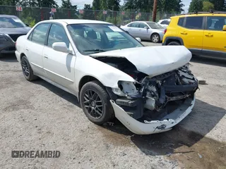 2002 Honda Accord LX with VIN JHMCG56482C035238, listed as a IAAI auction lot 42582563 with 244,560 mi miles and . Bid and sale history available at DreamBid. Image 1.