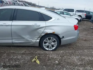 2015 Chevrolet Impala LT with VIN 1G1125S30FU138781, listed as a IAAI auction lot 41696424 with 150,239 mi miles. Bid and sale history available at carsss.com. Image 6.