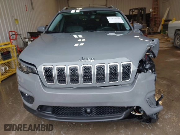 2021 Jeep Cherokee Latitude Lux with VIN 1C4PJMMX0MD214608, listed as a IAAI auction lot 41452997 with 31,441 mi miles and . Bid and sale history available at DreamBid. Image 12.