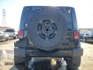 2016 Jeep Wrangler Unlimited 75th Anniversary with VIN 1C4BJWEG7GL113824, listed as a Copart auction lot 81372864 with 98,497 mi miles and Salvage title. Bid and sale history available at DreamBid. Image 6.