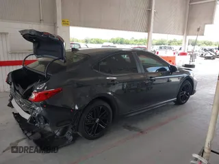 2025 Toyota Camry LE z VIN 4T1DAACK6SU057540, wystawiony jako IAAI lot #42186493 z przebiegiem 2 762 mil mil oraz . Historia ofert i sprzedaży dostępna na DreamBid. Obrazek 14.
