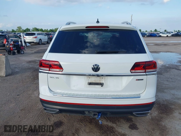 2021 Volkswagen Atlas SEL with VIN 1V2BR2CAXMC522670, listed as a IAAI auction lot 42110724 with 58,802 mi miles and . Bid and sale history available at DreamBid. Image 16.