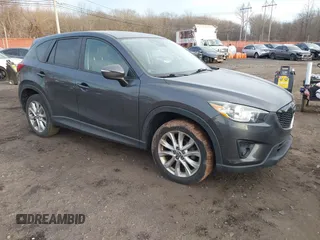2015 Mazda CX-5 Grand Touring with VIN JM3KE4DY5F0470445, listed as a IAAI auction lot 41236468 with 87,845 mi miles. Bid and sale history available at carsss.com. Image 1.