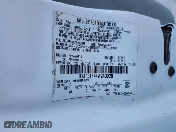 2007 Ford Focus S with VIN 1FAFP34N47W243028, listed as a Copart auction lot 55147695 with 218,672 mi miles and Salvage title. Bid and sale history available at DreamBid. Image 12.