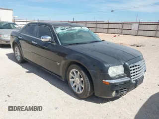 2006 Chrysler 300 C with VIN 2C3KA63H56H316500, listed as a IAAI auction lot 41811247 with 135,100 mi miles. Bid and sale history available at carsss.com. Image 1.