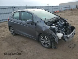 2015 Honda Fit EX-L with VIN 3HGGK5H80FM727081, listed as a Copart auction lot 44983845 with 57,556 mi miles and Clean Title. Bid and sale history available at DreamBid. Image 4.