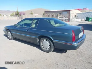 1993 Cadillac Eldorado ESC z VIN 1G6EL12Y4PU609197, wystawiony jako IAAI lot #41902066 z przebiegiem 96 251 mil mil oraz . Historia ofert i sprzedaży dostępna na DreamBid. Obrazek 3.