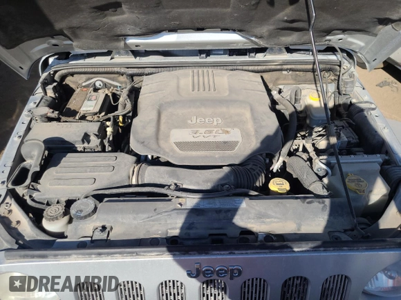2012 Jeep Wrangler Unlimited Call of Duty MW3 с VIN 1C4BJWFG3CL103865, выставлен на аукционе Copart как лот 74237754 с пробегом 104 232 миль миль и Списание • Salvage title. История ставок и продаж доступна на DreamBid. Изображение 12.