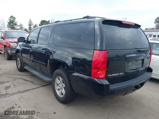 2013 GMC Yukon XL SLT with VIN 1GKS1KE00DR332987, listed as a IAAI auction lot 41512378 with 190,693 mi miles. Bid and sale history available at carsss.com. Image 14.