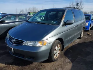 2002 Honda Odyssey EX-L z VIN 5FNRL180X2B022889, wystawiony jako IAAI lot #41546405 z przebiegiem 162 395 mil mil oraz . Historia ofert i sprzedaży dostępna na DreamBid. Obrazek 2.
