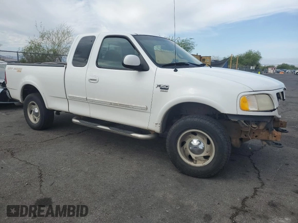 2001 Ford F-150 XL z VIN 1FTRX18L21NA29205, wystawiony jako Copart lot #58928795 z przebiegiem Nie podano mil oraz Szkoda całkowita • Salvage title. Historia ofert i sprzedaży dostępna na DreamBid. Obrazek 4.