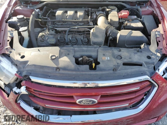 2014 Ford Taurus Limited with VIN 1FAHP2F81EG183128, listed as a Copart auction lot 82409384 with 107,624 mi miles and Salvage title. Bid and sale history available at DreamBid. Image 11.