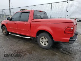 2003 Ford F-150 XLT with VIN 1FTRW07643KA38307, listed as a Copart auction lot 51496915 with 112,110 mi miles and Salvage Title. Bid and sale history available at carsss.com. Image 2.