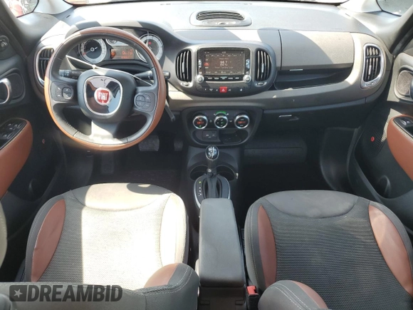 2014 FIAT 500L Trekking with VIN ZFBCFADH9EZ015734, listed as a Copart auction lot 57647185 with 67,302 mi miles and Salvage title. Bid and sale history available at DreamBid. Image 8.