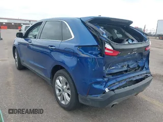 2022 Ford Edge Titanium with VIN 2FMPK4K95NBB05789, listed as a IAAI auction lot 42582372 with 58,379 mi miles and . Bid and sale history available at DreamBid. Image 3.