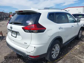 2019 Nissan Rogue SV with VIN KNMAT2MT3KP527956, listed as a IAAI auction lot 42617872 with 119,450 mi miles and . Bid and sale history available at DreamBid. Image 4.