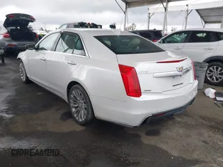 2018 Cadillac CTS Sedan Luxury AWD with VIN 1G6AX5SX2J0127618, listed as a IAAI auction lot 41785890 with 79,994 mi miles. Bid and sale history available at carsss.com. Image 3.