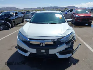 2017 Honda Civic EX z VIN 2HGFC2F73HH539612, wystawiony jako IAAI lot #41767164 z przebiegiem 87 924 mil mil oraz . Historia ofert i sprzedaży dostępna na DreamBid. Obrazek 12.