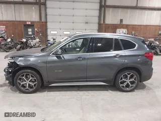 2016 BMW X1 xDrive28i with VIN WBXHT3C3XG5E47536, listed as a IAAI auction lot 41672144 with 97,932 mi miles. Bid and sale history available at carsss.com. Image 14.