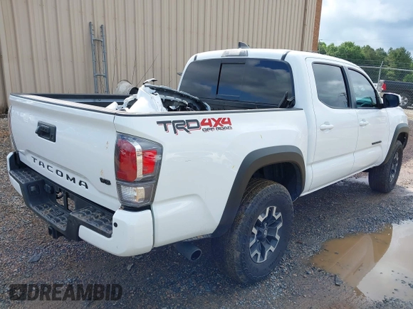 2023 Toyota Tacoma SR with VIN 3TMCZ5AN7PM639378, listed as a IAAI auction lot 42222407 with 38,172 mi miles and . Bid and sale history available at DreamBid. Image 4.