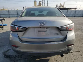 2016 Scion iA z VIN 3MYDLBZV7GY138266, wystawiony jako Copart lot #83457914 z przebiegiem 98 082 mil mil oraz Szkoda całkowita • Salvage title. Historia ofert i sprzedaży dostępna na DreamBid. Obrazek 6.