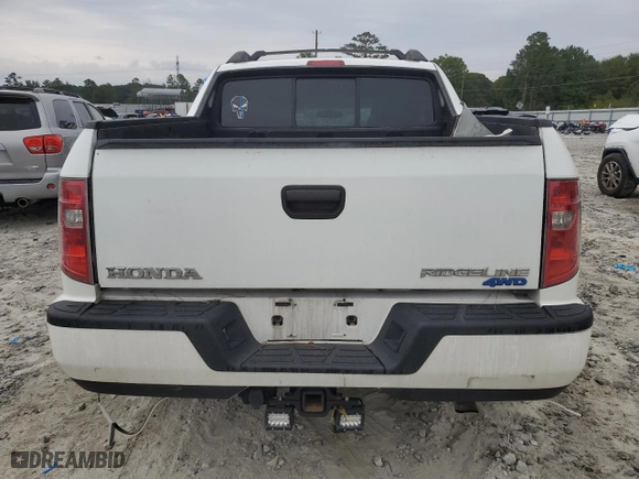 2010 Honda Ridgeline RT with VIN 5FPYK1F27AB008053, listed as a Copart auction lot 71348134 with 167,498 mi miles and Salvage Title. Bid and sale history available at carsss.com. Image 6.