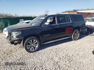 2015 Chevrolet Suburban LTZ with VIN 1GNSCKKC1FR713083, listed as a Copart auction lot 48213585 with 178,321 mi miles and Salvage Title. Bid and sale history available at DreamBid. Image 1.