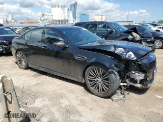 2015 BMW M5 with VIN WBSFV9C55FD595221, listed as a Copart auction lot 56251524 with 38,648 mi miles and Salvage Title. Bid and sale history available at carsss.com. Image 4.