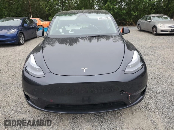 2024 Tesla Model Y Long Range с VIN 7SAYGDEE5RF130383, выставлен на аукционе Copart как лот 60263265 с пробегом 12 531 миль миль и Списание • Salvage title. История ставок и продаж доступна на DreamBid. Изображение 5.