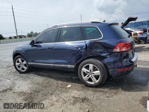 2013 Volkswagen Touareg Lux с VIN WVGEF9BP0DD002456, выставлен на аукционе Copart как лот 56034435 с пробегом 131 412 миль миль и Списание • Salvage title. История ставок и продаж доступна на DreamBid. Изображение 2.