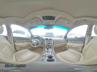 2005 Lincoln LS Sport z VIN 1LNHM87A05Y667868, wystawiony jako Copart lot #73318074 z przebiegiem 114 623 mil mil oraz Szkoda całkowita • Salvage title. Historia ofert i sprzedaży dostępna na DreamBid. Obrazek 13.