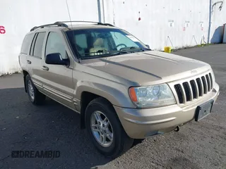 1999 Jeep Grand Cherokee Limited with VIN 1J4GW68N3XC688112, listed as a IAAI auction lot 41640033 with 196,851 mi miles. Bid and sale history available at carsss.com. Image 1.