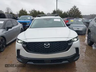 2024 Mazda CX-50 2.5 S Premium Package with VIN 7MMVABDM8RN197608, listed as a IAAI auction lot 41058947 with 7,404 mi miles. Bid and sale history available at carsss.com. Image 13.