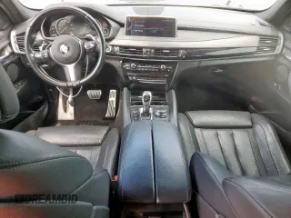 2017 BMW X6 z VIN 5UXKU6C31H0W38581, wystawiony jako Copart lot #58042385 z przebiegiem 124 789 mil mil oraz Tytuł czysty. Historia ofert i sprzedaży dostępna na DreamBid. Obrazek 8.