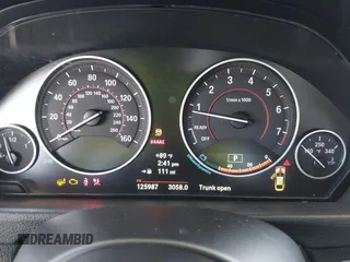 2015 BMW 4 Series 428i with VIN WBA4A5C58FD410076, listed as a IAAI auction lot 39384271 with 125,987 mi miles and . Bid and sale history available at DreamBid. Image 7.