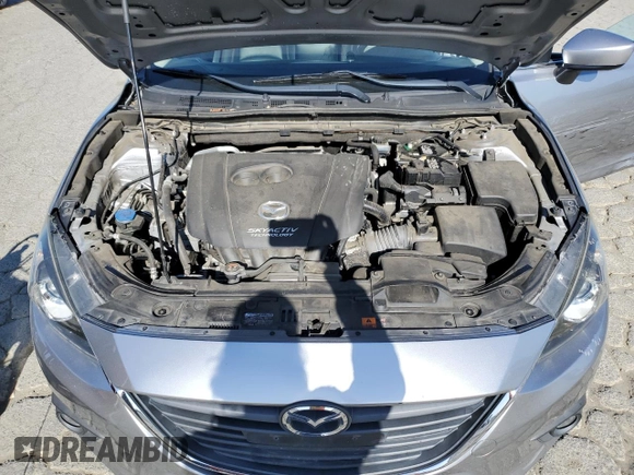 2015 Mazda 3 i Grand Touring z VIN JM1BM1M70F1260802, wystawiony jako Copart lot #60662705 z przebiegiem 89 974 mil mil oraz Szkoda całkowita • Salvage title. Historia ofert i sprzedaży dostępna na DreamBid. Obrazek 11.