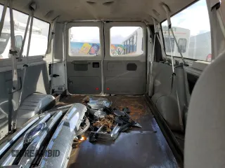 2011 Ford Econoline Passenger XL with VIN 1FBNE3BLXBDA75840, listed as a Copart auction lot 72030614 with 57,183 mi miles and Salvage Title. Bid and sale history available at DreamBid. Image 10.