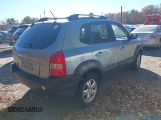 2008 Hyundai Tucson SE with VIN KM8JN12D38U734630, listed as a IAAI auction lot 40819696 with 240,265 mi miles and . Bid and sale history available at DreamBid. Image 4.