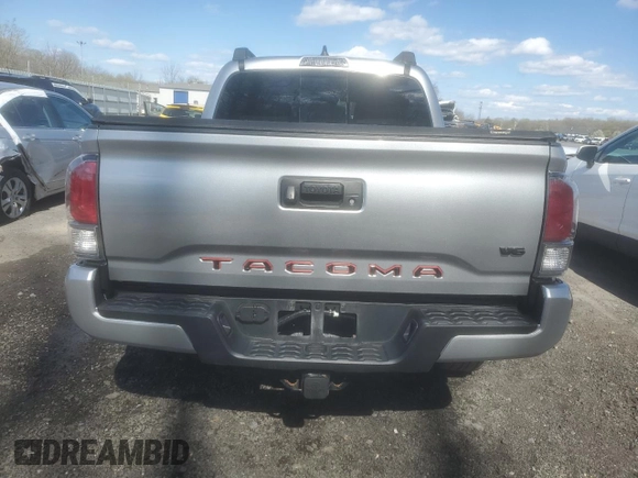 2023 Toyota Tacoma SR z VIN 3TMCZ5AN6PM539899, wystawiony jako Copart lot #52238445 z przebiegiem 30 070 mil mil oraz Szkoda całkowita • Salvage title. Historia ofert i sprzedaży dostępna na DreamBid. Obrazek 6.