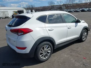 2016 Hyundai Tucson SE with VIN KM8J3CA48GU087840, listed as a IAAI auction lot 41855450 with 106,524 mi miles. Bid and sale history available at carsss.com. Image 4.